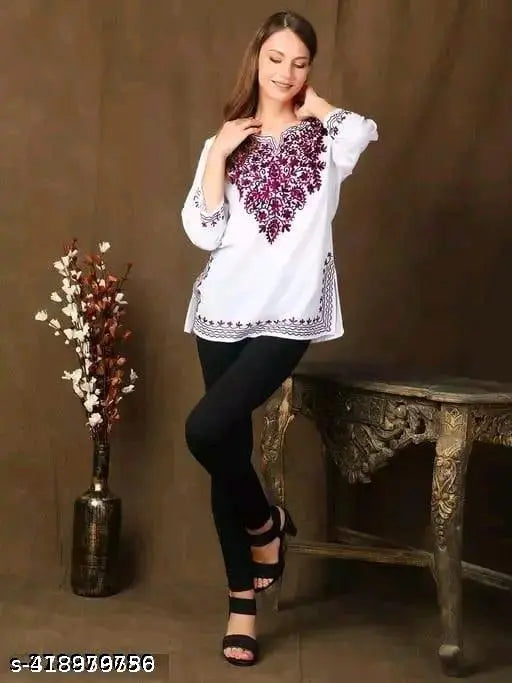 Maroon embroidery white kurti..