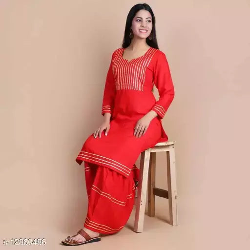Mialo Lace plain sharara kurta.