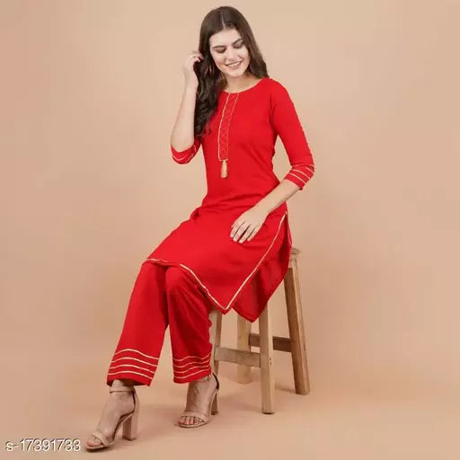 Mialo red lace kurta with pant.