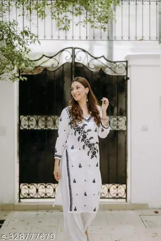Anni Designer Women's White Cotton Blend Straight Chikankari Floral Embroidered Kurti