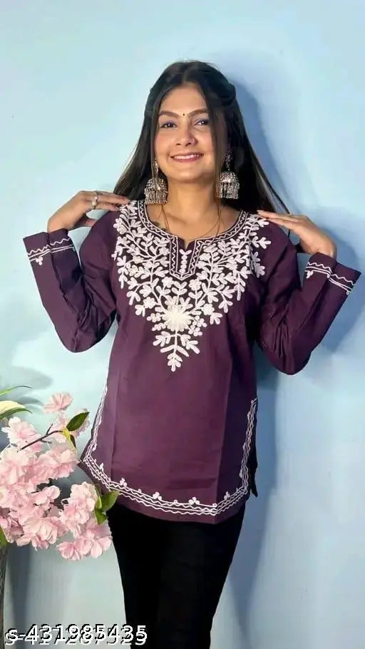 Embroidered trendy short kurti .purple