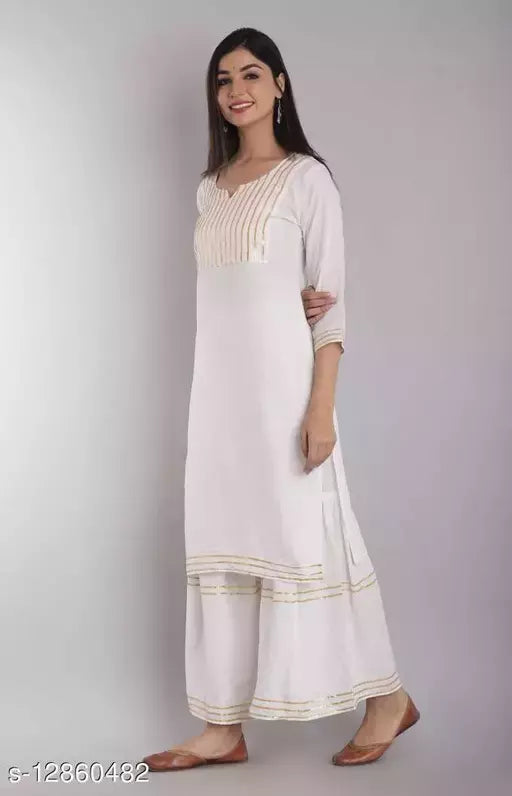 Mialo Lace plain sharara kurta.