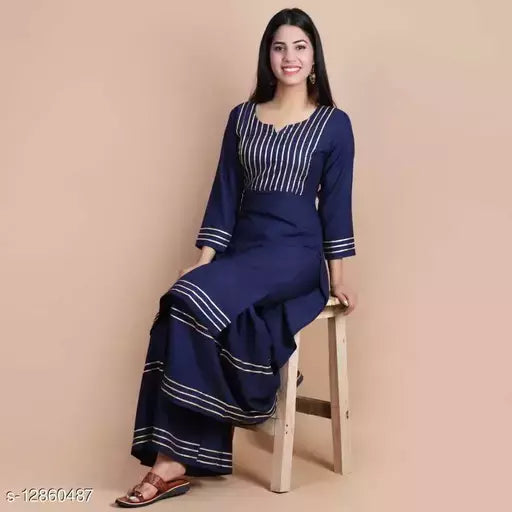 Mialo Lace plain sharara kurta.