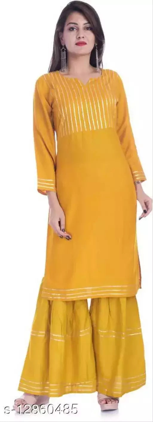 Mialo Lace plain sharara kurta.