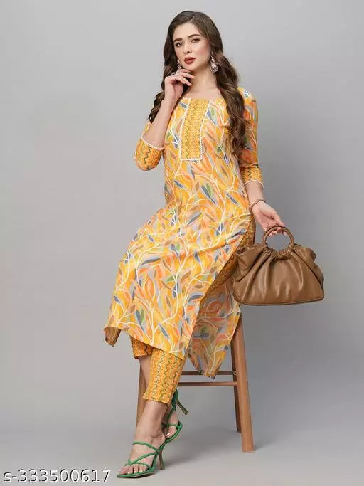 Anni Designer Women's Yellow Cotton Blend Straight Printed Kurta With Trousers