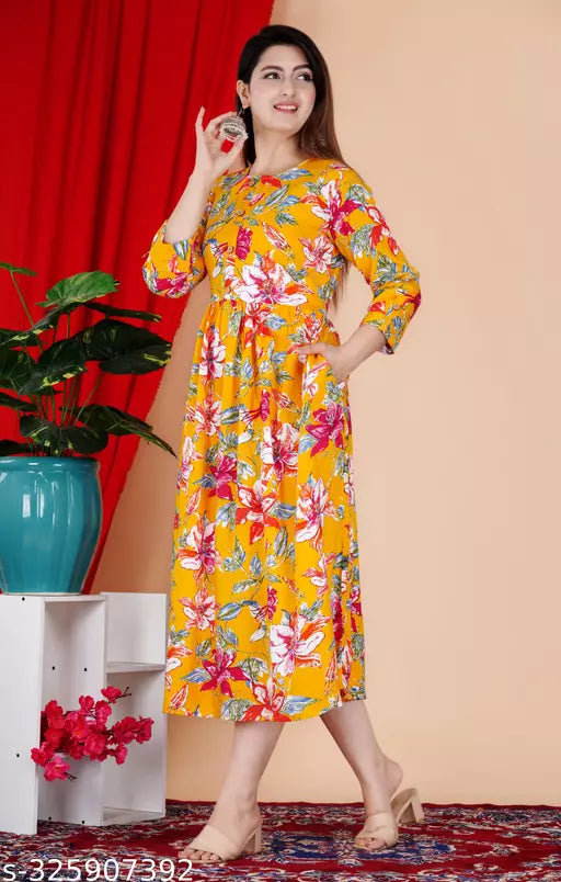 Shree Ganesh fashion's Rayon Anarkali Printed Yellow  Kurti for women